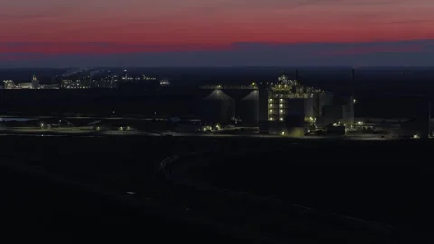 Conical Grain Storage Silos &amp; Processing Headhouse After Dark — Industrial Stock Footage 337435466