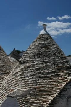 Conical roofs of Trulli Stock Photos