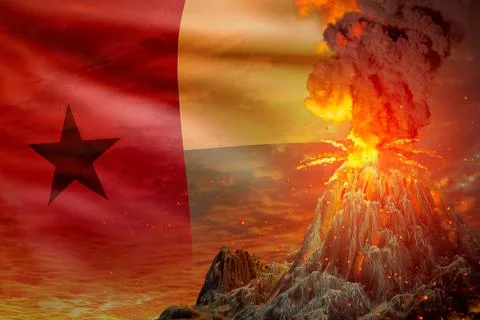 Conical volcano eruption at night with explosion on Guinea flag background 스톡 일러스트