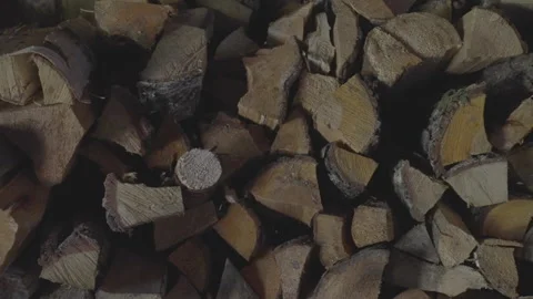 Coniferous firewood stack put in storage premise in yard Stock Footage 241734115
