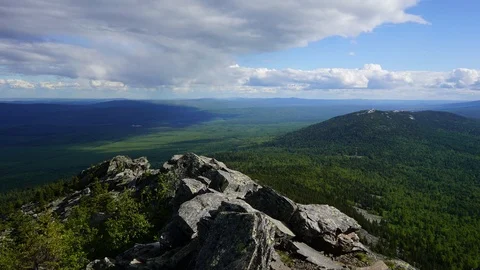 Coniferous forest growing on stony soil of a mountain in the Urals Stock-Footage 116391829