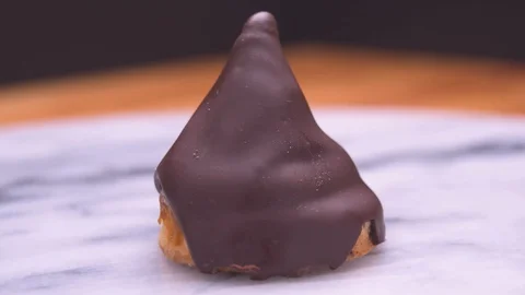 Conitos Dulce de Leche with Chocolate on Marble Spinning Rotation Video stock 129349108