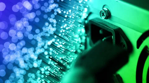 Connect and pull out electric cable into PC with Fiber optics background Stock Footage 66336900