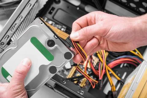 Connect the hard drive. Stock Photos
