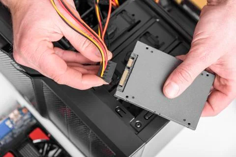 Connect the hard drive. Stock Photos