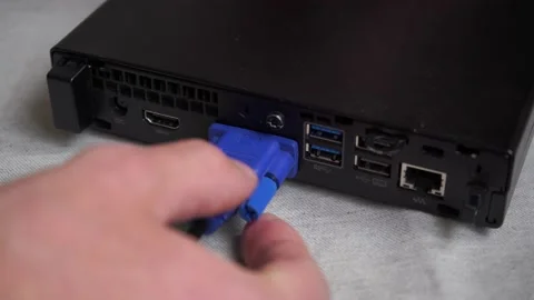 Connect HDMI cable to desktop computer. Connect VGA cable to PC Stock Footage 221122103