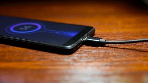 Connect the Magnetic cable to your phone. Overfly Magnetic Micro USB Stock Footage 114185432