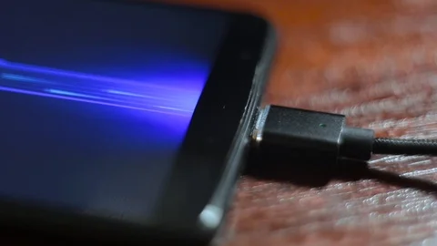 Connect the Magnetic cable to your phone. Overfly Magnetic Micro USB Cable. Stock Footage 114185486
