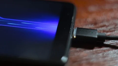 Connect the Magnetic cable to your phone. Overfly Magnetic Micro USB Cable. Stock Footage 114185500