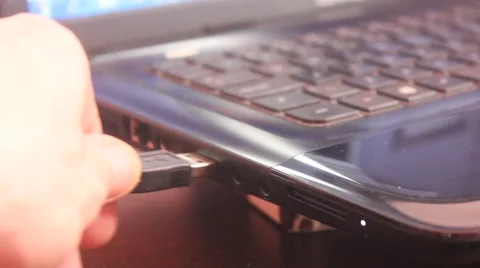Connect usb cable device at laptop Stock Footage 45697112