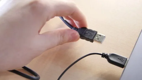 Connect USB Cord to Laptop Stock Footage 101435179