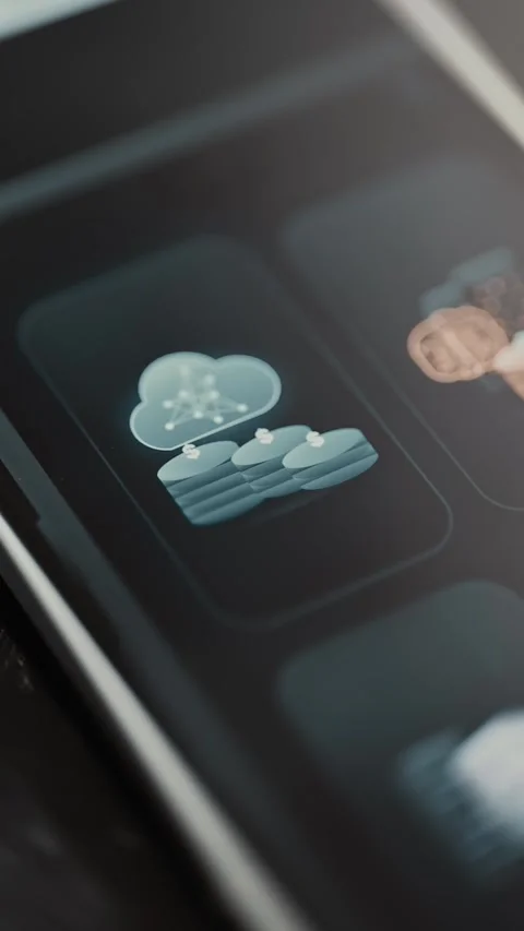 Connected blue cloud floats above three layered coin stacks marked Stock Footage 343375511