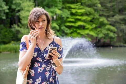 Connected Campus Chronicles: Journey of a Tech-Forward Brunette College Stu.. Stock Photos