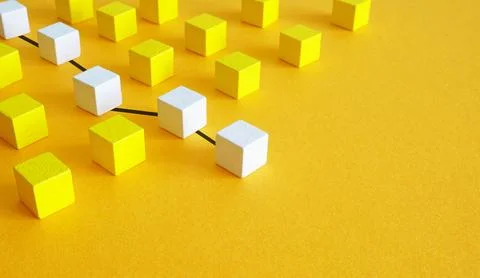 Connected cubes as a logical sequence of actions. Structured thinking. Stock Photos