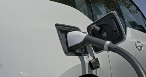 Connected EV with Electrify America’s electric vehicle charging station Stock Footage 137922634