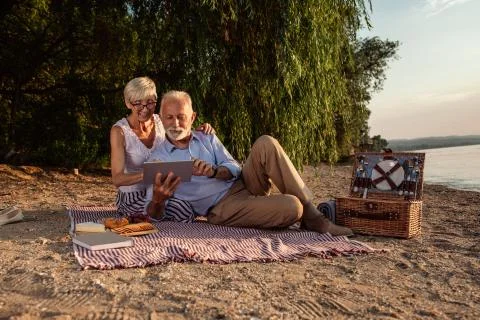 Connected while picnicking Stock Photos