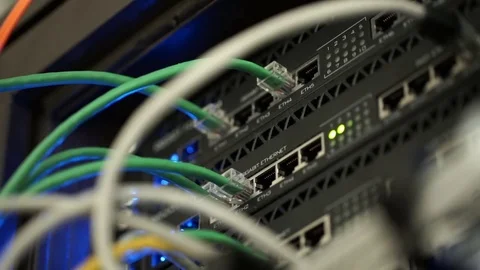 Connecting Cable And The LED Lights Blinks. The Internet Server And Server of Video stock 73051630