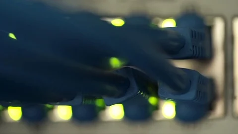 Connecting Cable And The LED Lights Blinks. The Internet Server And Server of Video stock 73052138