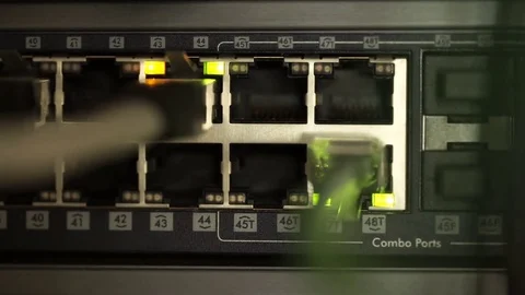 Connecting Cable And The LED Lights Blinks. The Internet Server And Server of Video stock 73052310