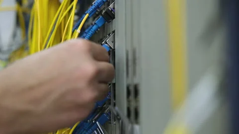 Connecting cables to enhance the quality and service of the fiber optic network Stock Footage 201078026