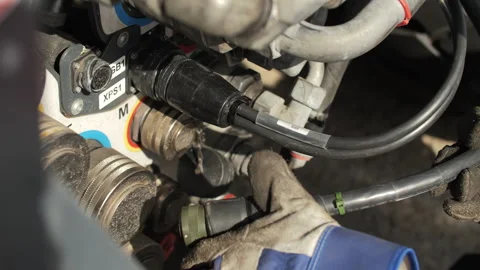 Connecting cables to hydraulic system of modular transport platform Stock Footage 345173902