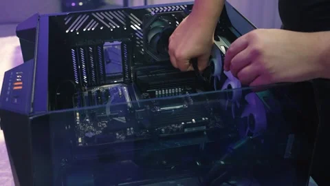 Connecting CPU power cable to the motherboard and managing wires Stock Footage 328986231