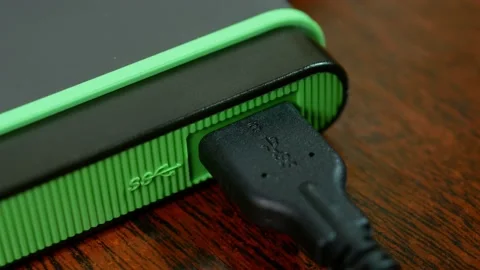 Connecting the device to a PC. HDD for storing computer data. Stock Footage 169047571