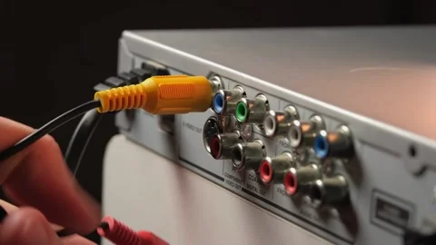 Connecting a DVD player, connecting tulips to a connector Stock Footage 265013648