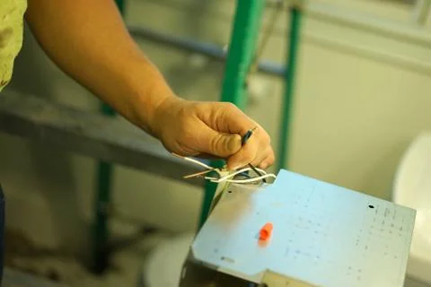 Connecting electrical cables. Stock Photos