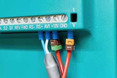 Connecting the electrical wires to the operator panel at the rear. Stock Photos