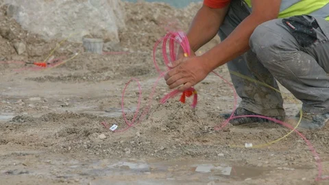 Connecting explosives cables in open limestone quarry Stock Footage 100465607