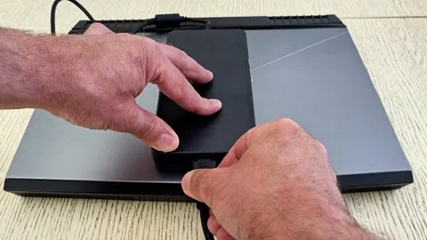 Connecting External SSD to Laptop via USB Adapter for Fast Data Stock Footage 336708272