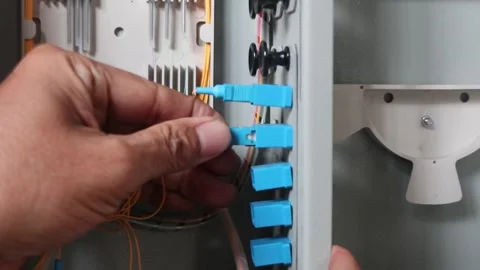 Connecting fiber optic cables to internet network ports. Connecting the internet Stock Footage 289269537