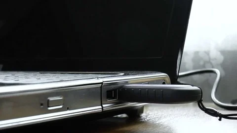 Connecting flash drive to laptop Stock Footage 80754893