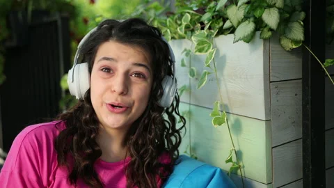 Connecting with interlocutor to show video report via online. Girl communicates Stock-Footage 136668775