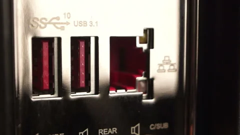 Connecting the Internet cable to the computer, close-up 스톡 동영상 104644680