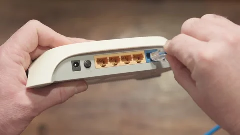 Connecting Internet cable connector to router Video stock 263062298