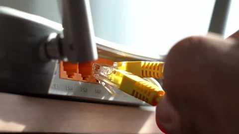 Connecting the Internet Cable from the Router. Connect to the internet. Stock Footage 160903161