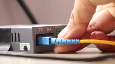 Connecting the internet with a fiber optic cable Stock Footage 291595547