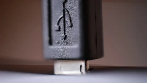 Connecting micro USB cable. Extreme closeup 動画素材 85463412