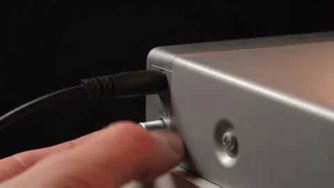 Connecting a microphone to a mini-jack Stock Footage 265013783