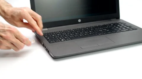 Connecting a network cable to a laptop computer Video stock 164241371