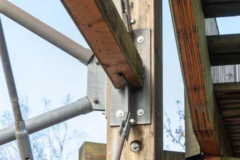 The connecting node of a wooden beam and a metal plate in the frame of the .. 写真素材