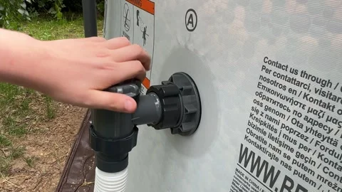Connecting a Pool Pump to a Large Inflatable Pool Video stock 279248417