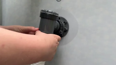 Connecting a Pool Pump to a Large Inflatable Pool Video stock 279248581