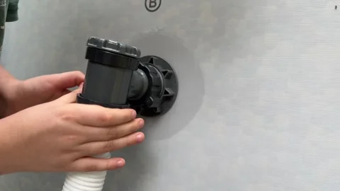 Connecting a Pool Pump to a Large Inflatable Pool Video stock 279248646