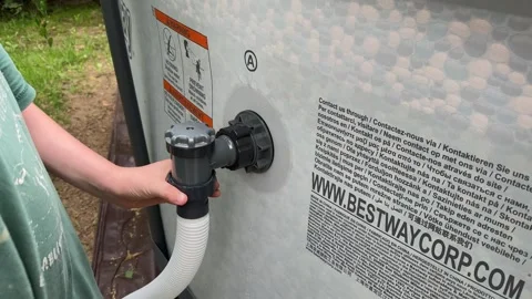 Connecting a Pool Pump to a Large Inflatable Pool Video stock 279248767