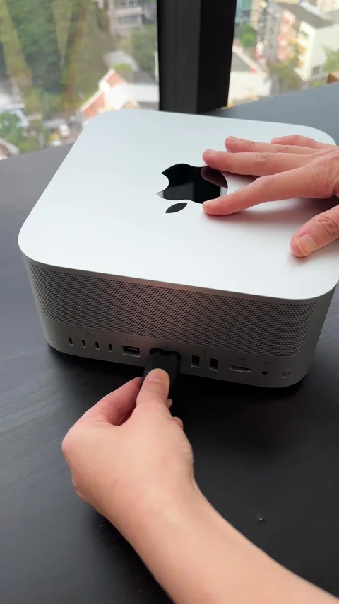 Connecting Power Cable to Compact Desktop Computer on Desk Stock Footage 318434846