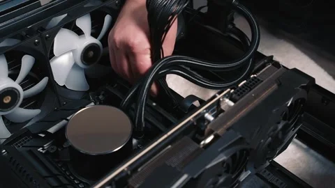 Connecting power cables to motherboard during PC build Video stock 325805836