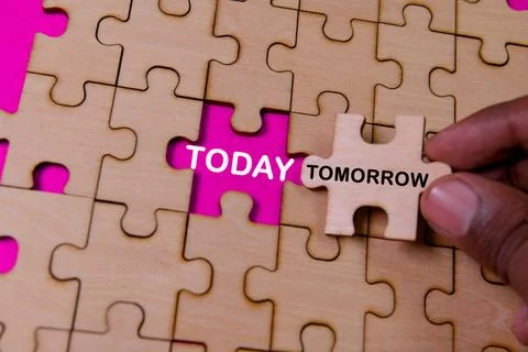 Connecting puzzle pieces in a creative space Stock Photos